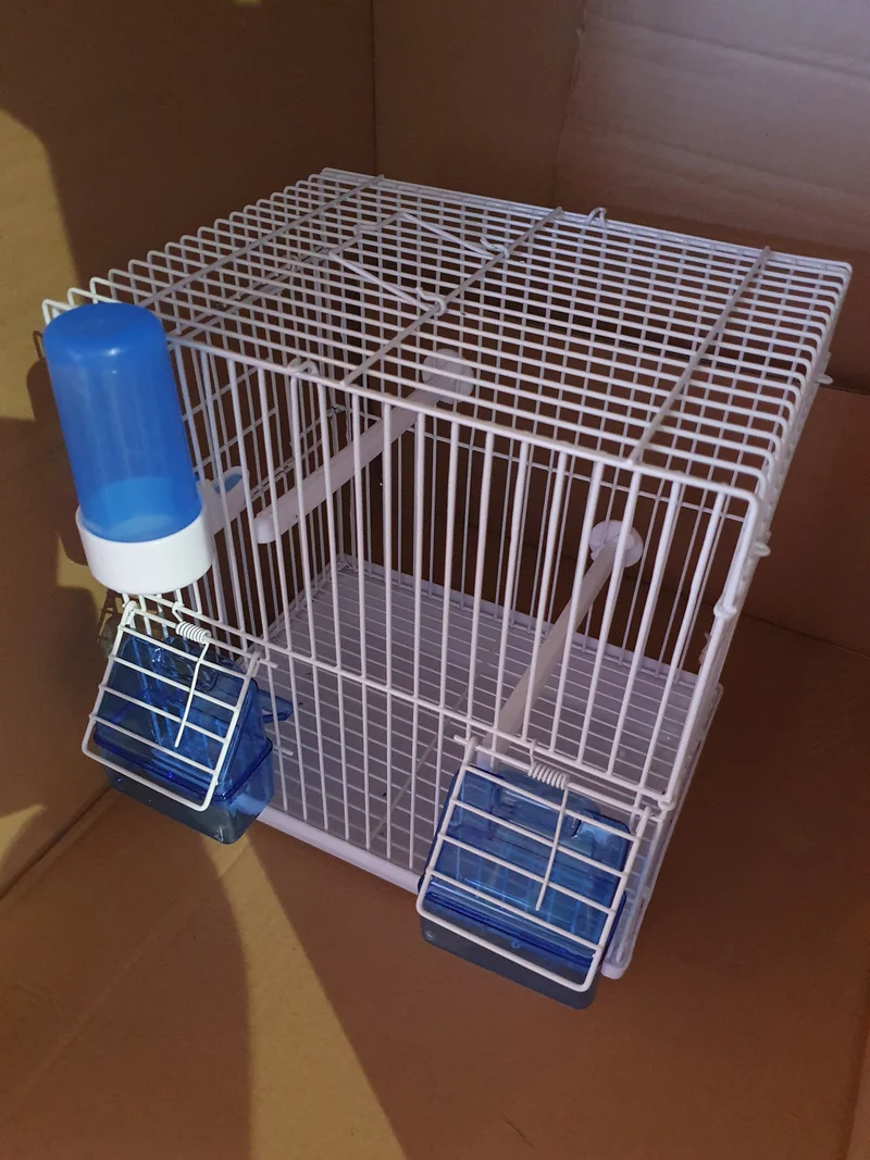 Cage de transport / Cage chantante bleue