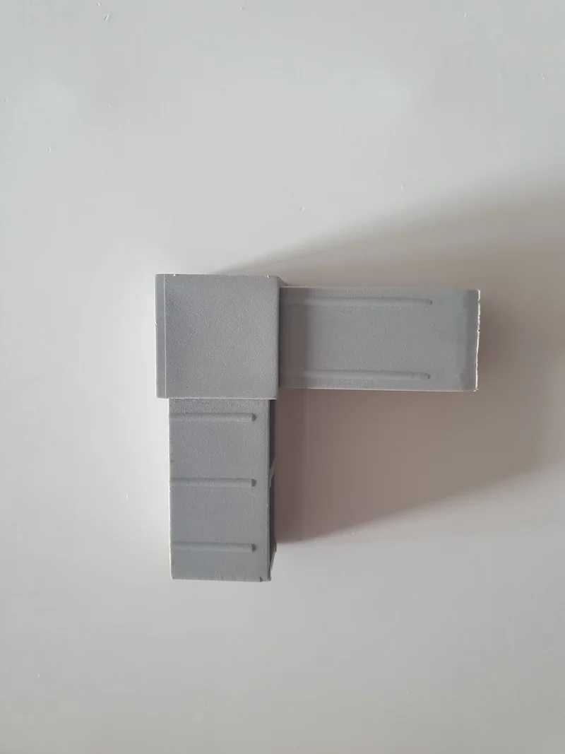 L pièce de connexion volière